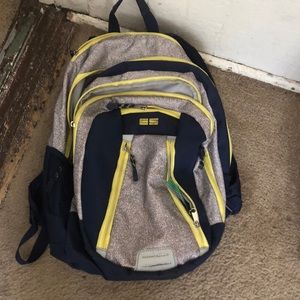 Gray, yellow, and blue backpack